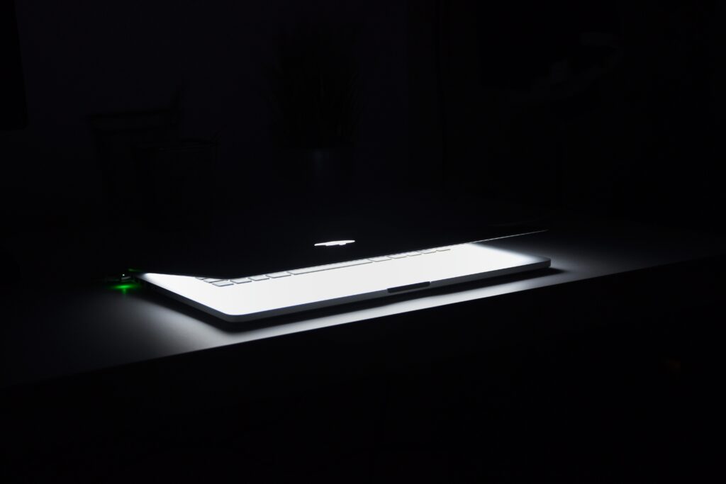 apple macbook with glowing logo
